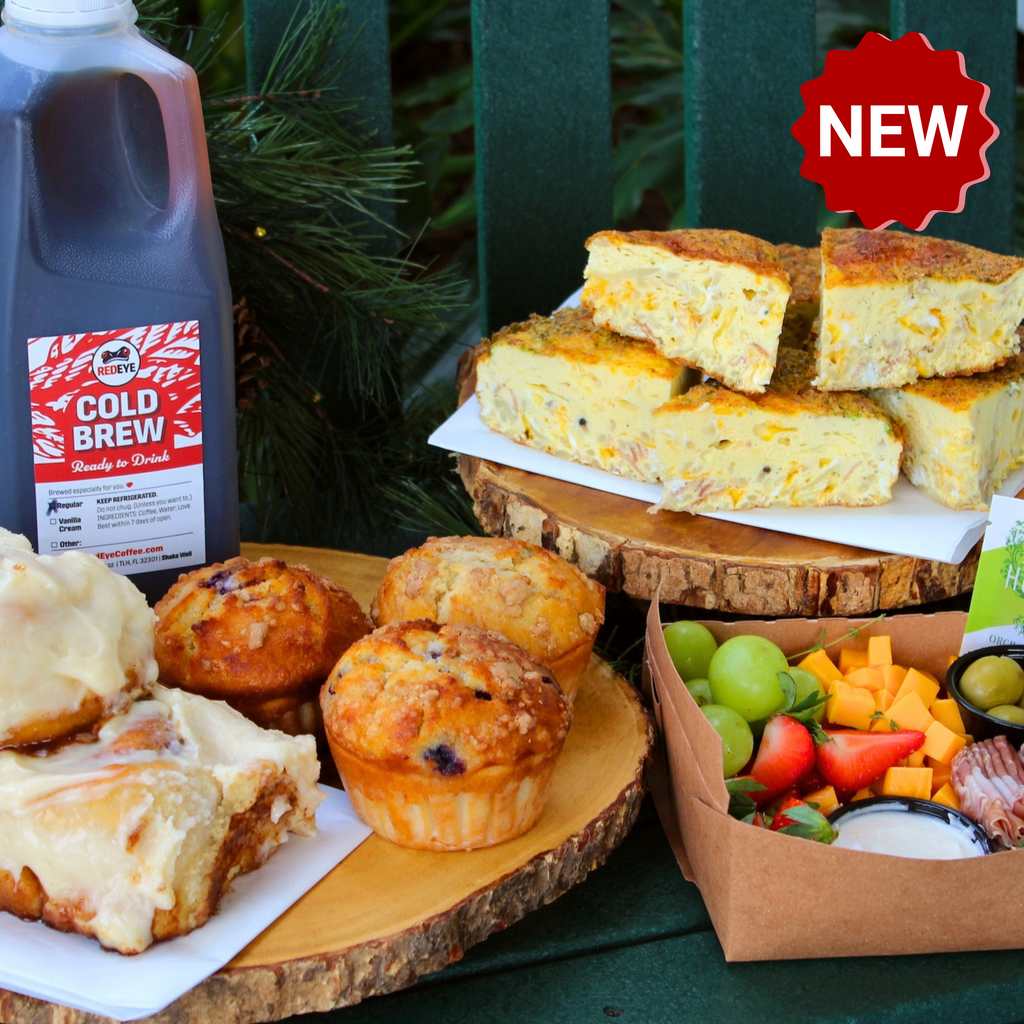 Cozy Brunch breakfast catering package by RedEye Coffee in Tallahassee, FL. Includes cold brew, muffins, cinnamon rolls, breakfast casseroles, and a grazing box. 